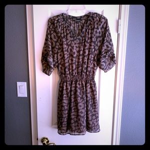 Women’s dress with sheer overlay